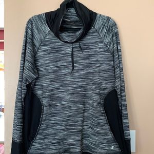 Black and gray striped Energy Zone athletic pull over with 2 front pockets.